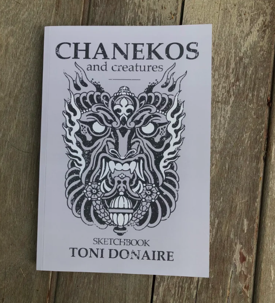 Cover of the CHANKEOS Sketchbook 2024 – a curated collection of Toni Donaire’s latest tattoo designs, featuring a bold black and white creature illustration on soft-touch paper.