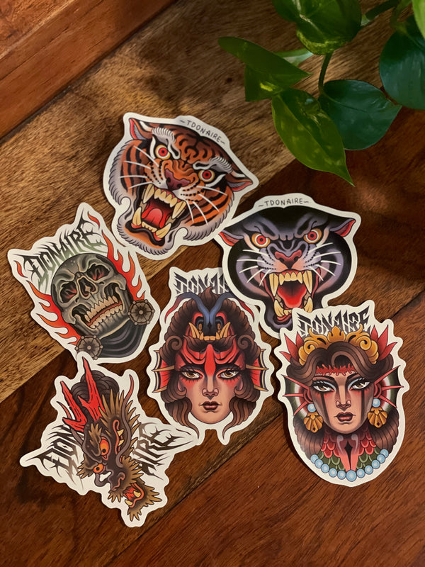 Set of six stickers by Toni Donaire, including tiger, skull, dragon, panther and mystic female characters
