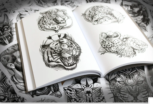 Open sketchbook showing two stylized female portrait sketches in pencil, with intricate details and ornamental elements.